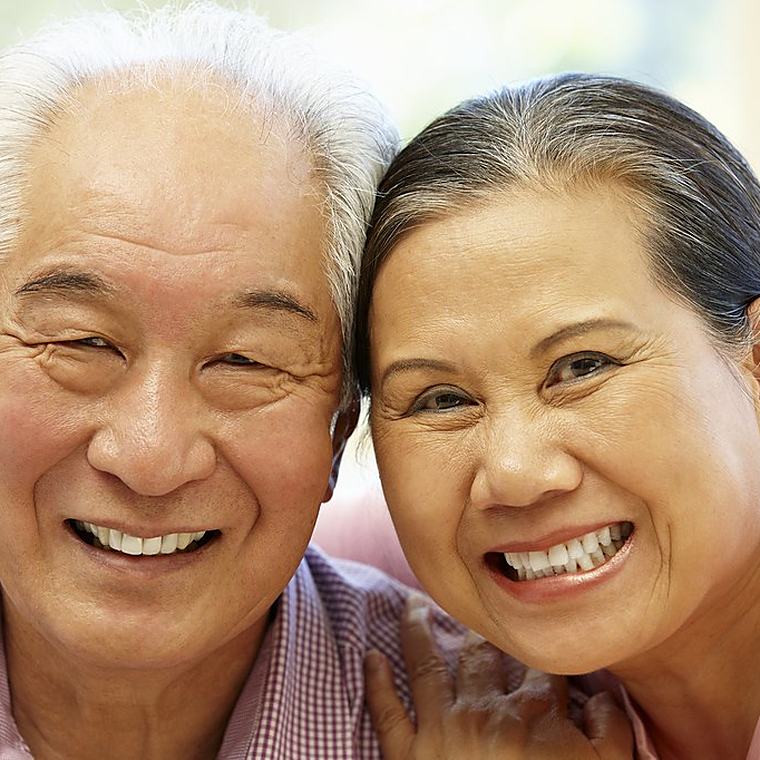 A caregiver listening to a client at home