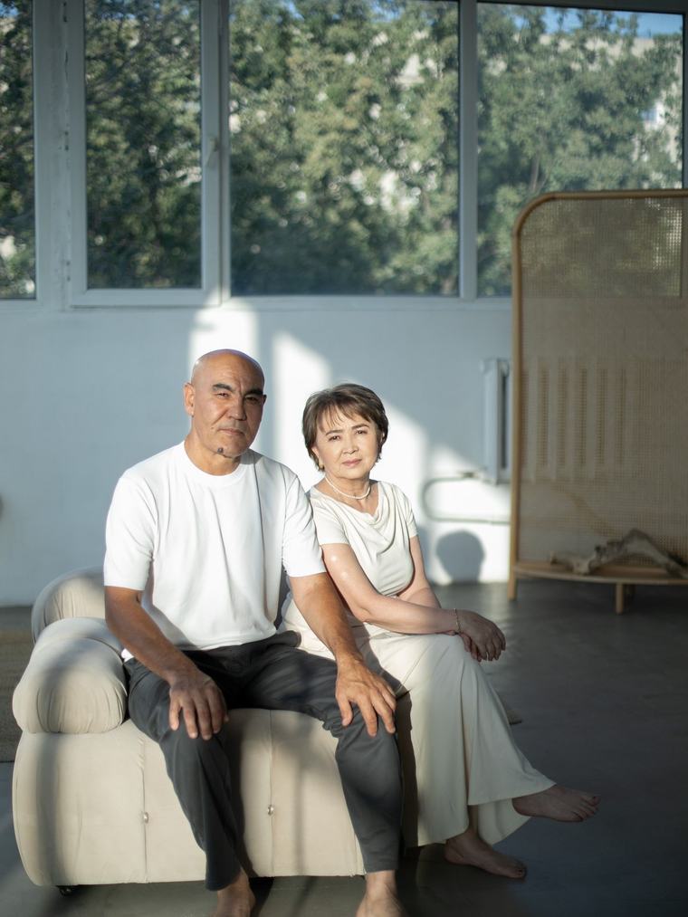 Two people sharing a conversation over tea