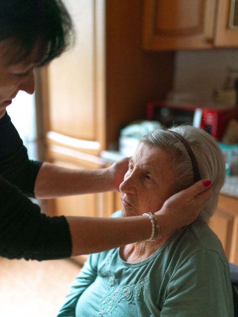 A caregiver offering a steadying hand