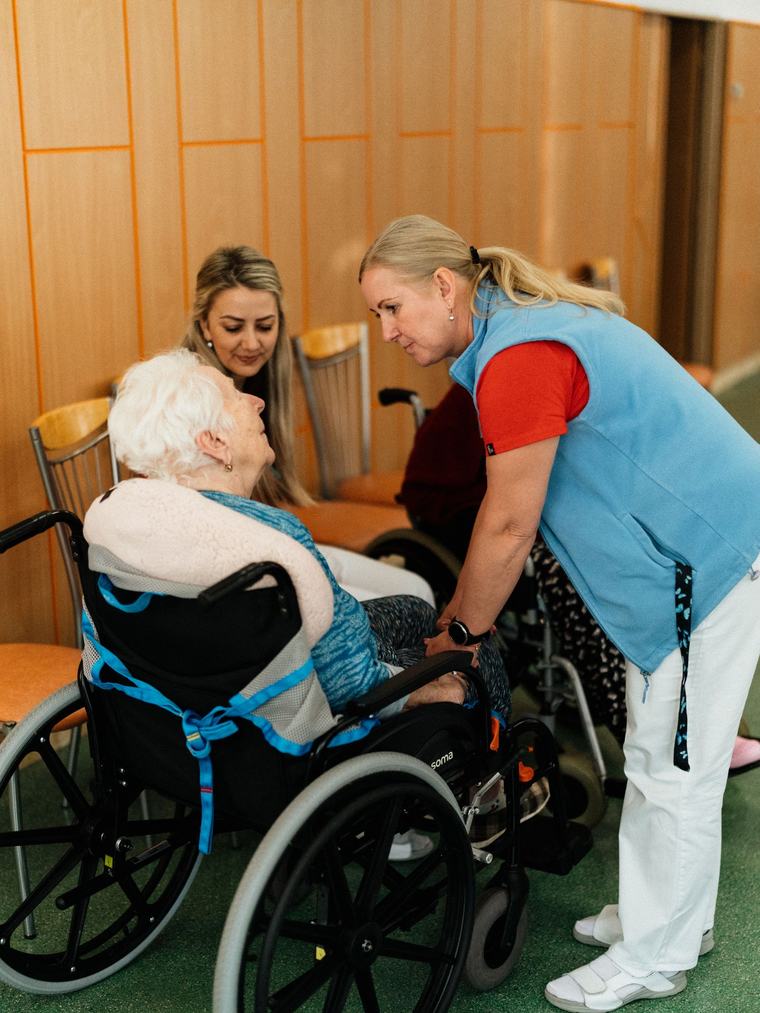 A caregiver preparing a meal in a client's kitchen